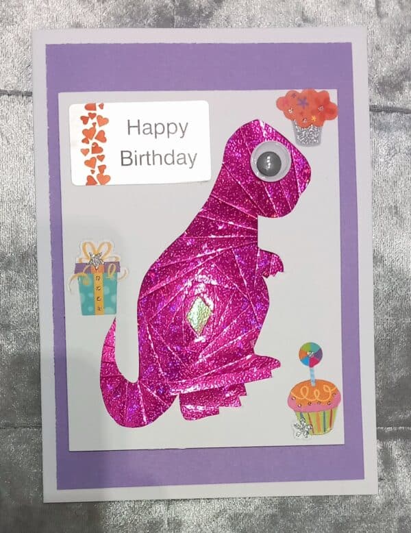 Pink sparkly Dinosaur birthday card. - main product image