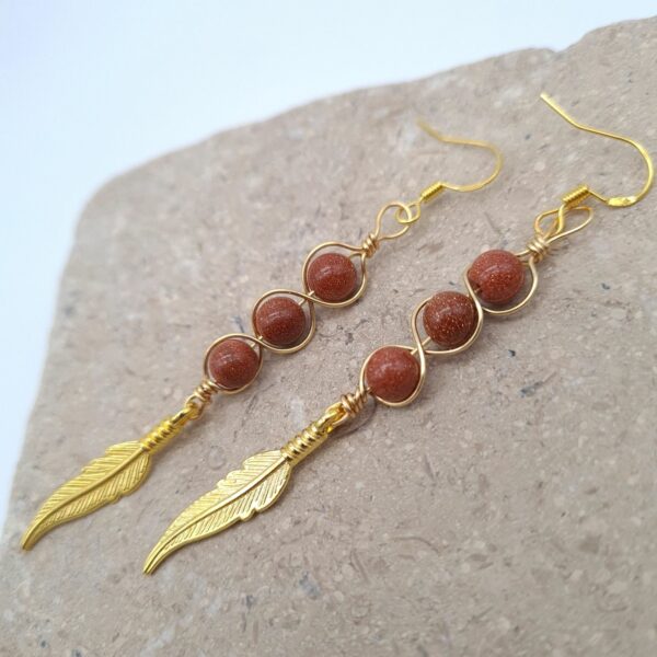 Handcrafted Long Drop Gold Feather Earrings With Wrapped Gold Sandstone Beads - product image 3