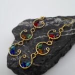 Handcrafted long drop gold wire wrap earrings with multi colour beads