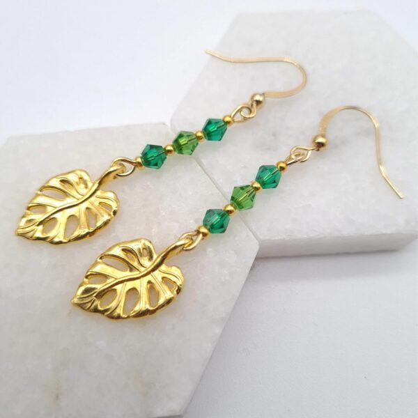 Gold Earrings With Green Glass Beads and Monsterra Leaf Charms - product image 3