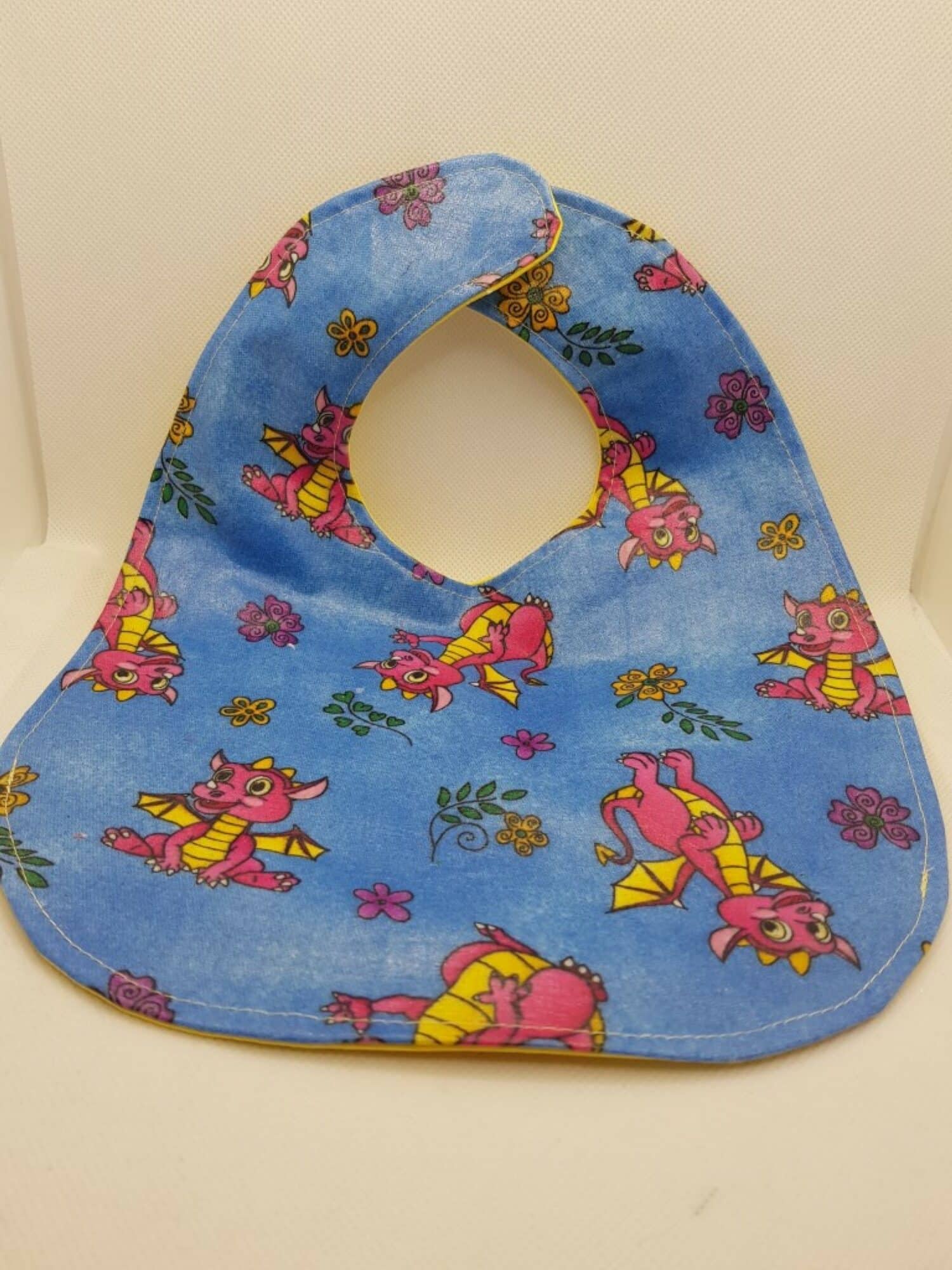 Toddler Bib: 1-4 years blue with pink dragons - main product image