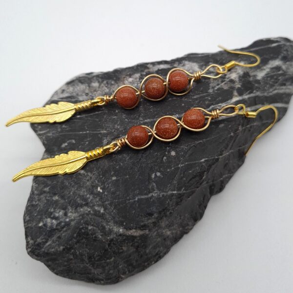 Handcrafted Long Drop Gold Feather Earrings With Wrapped Gold Sandstone Beads - main product image
