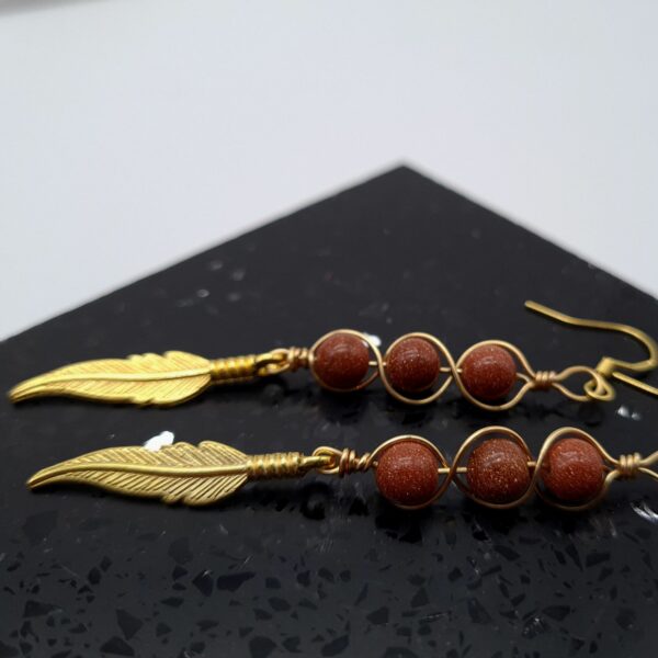 Handcrafted Long Drop Gold Feather Earrings With Wrapped Gold Sandstone Beads - product image 4