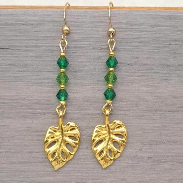 Gold Earrings With Green Glass Beads and Monsterra Leaf Charms - product image 4