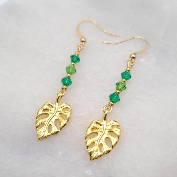 Gold Earrings With Green Glass Beads and Monsterra Leaf Charms - product image 2