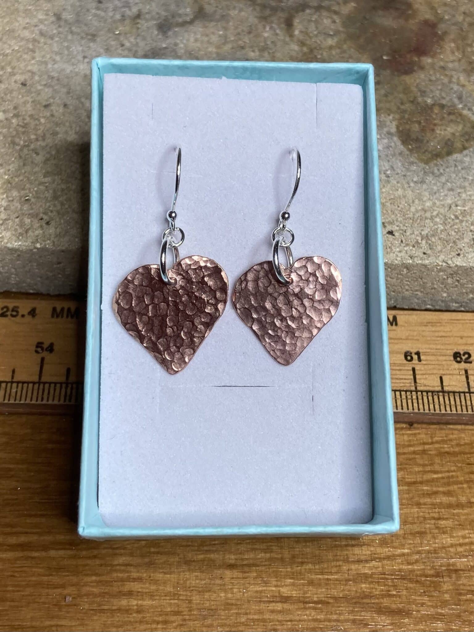 Sterling silver and hammered copper heart earrings - main product image