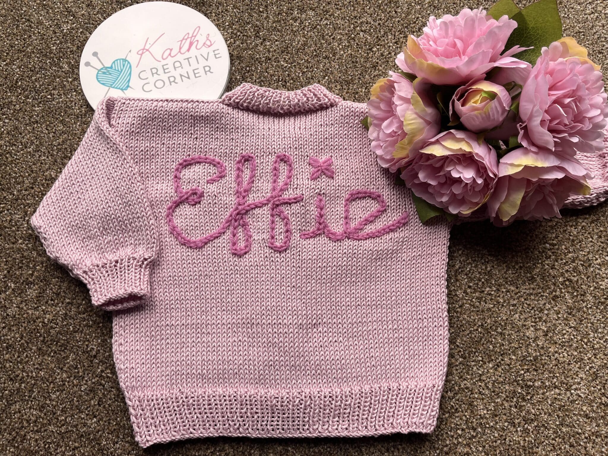 Hand knitted cardigan with embroidered name – Made to order - main product image