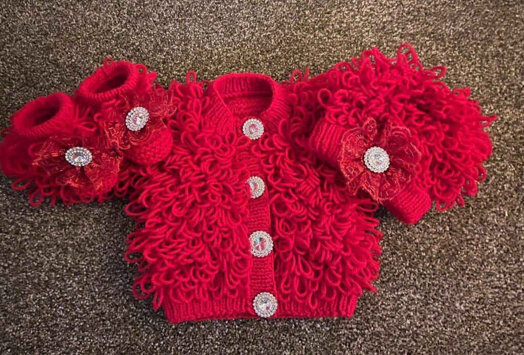 Hand knitted Loopy cardigan, hat and booties