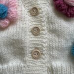 Hand knitted flower cardigan