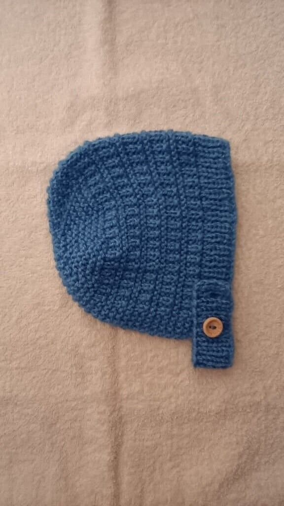 Hand Knitted Baby Bonnet With Adjustable Strap 0-3 months Cornflower Blue - main product image