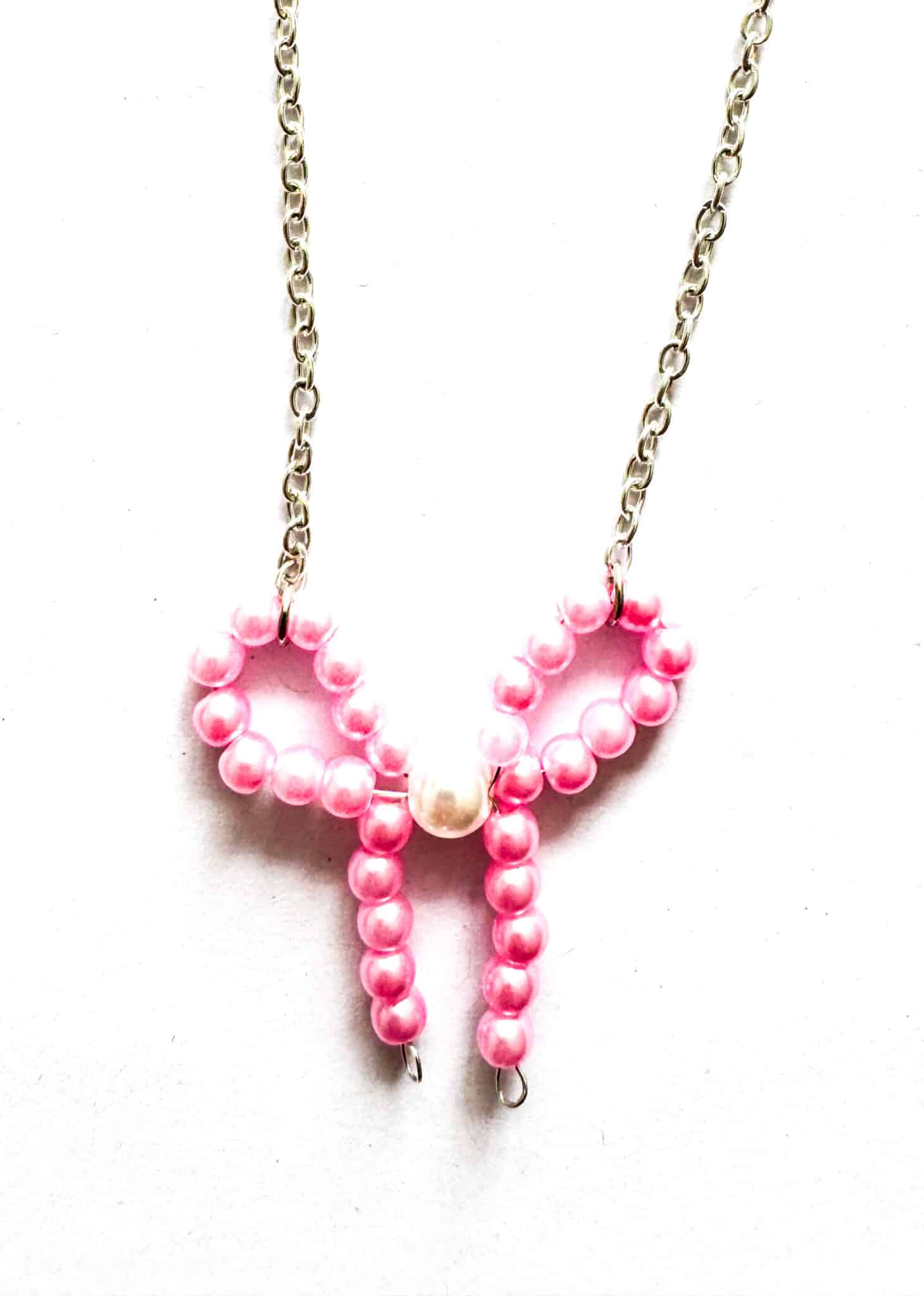 Handmade beaded bow necklaces - main product image
