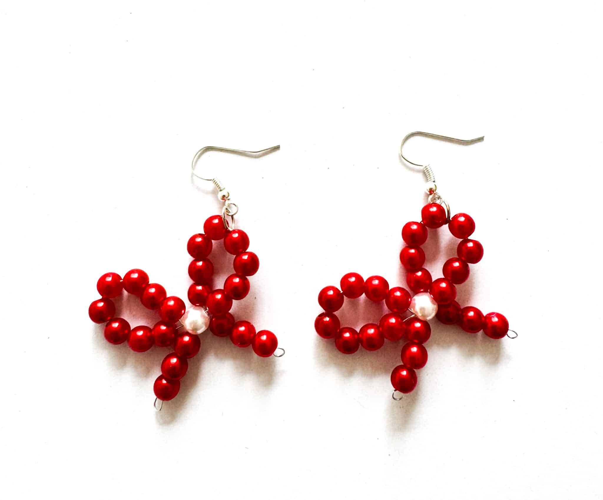 Beaded bow earrings - main product image