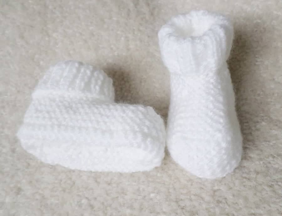 Hand knitted white newborn baby booties - main product image
