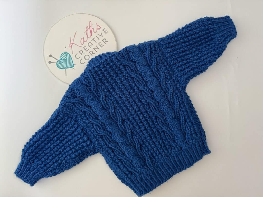 Hand knitted Baby Aran Cardigan