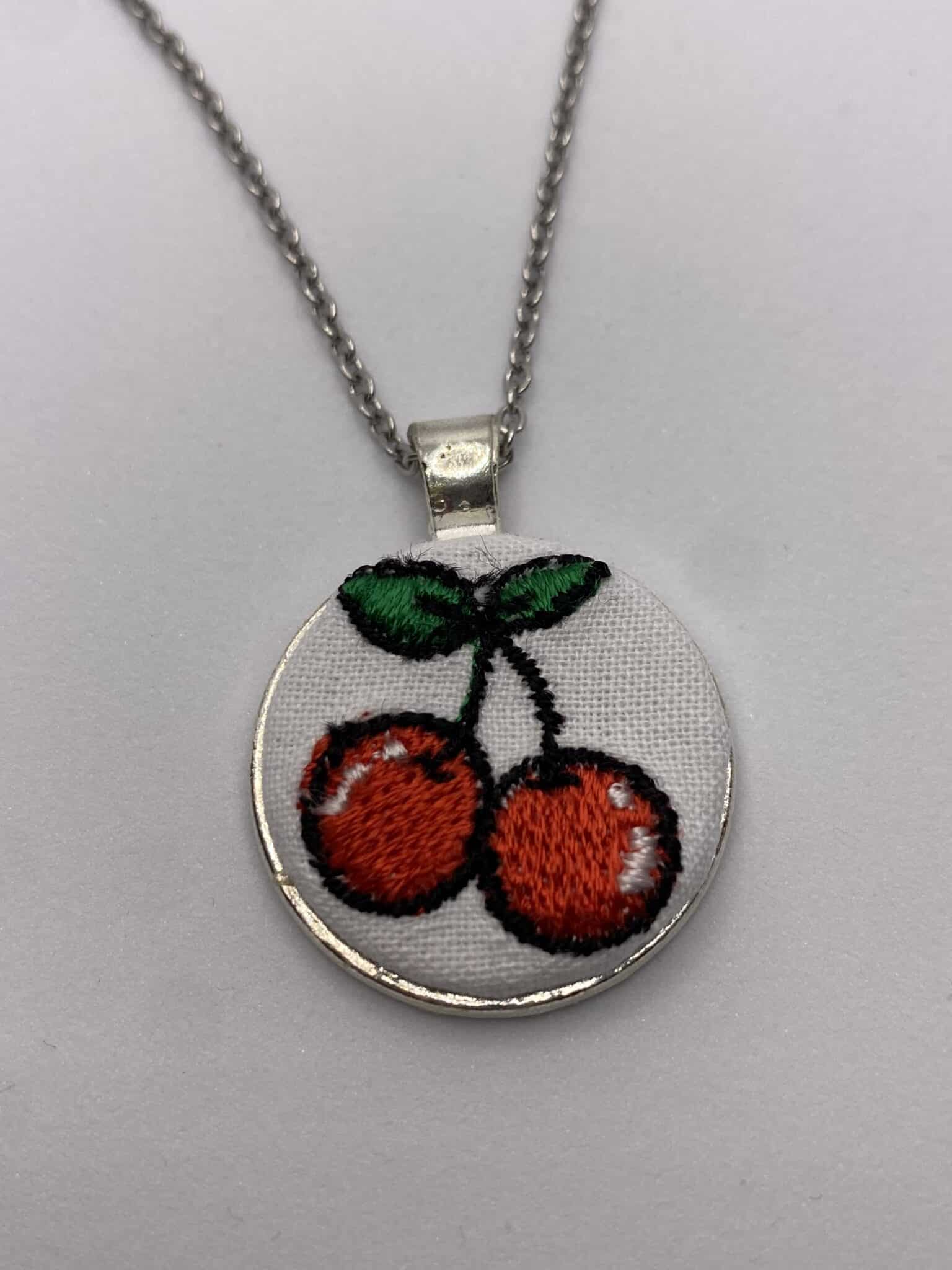 Embroidered cherries pendant on 18 inch chain necklace - main product image