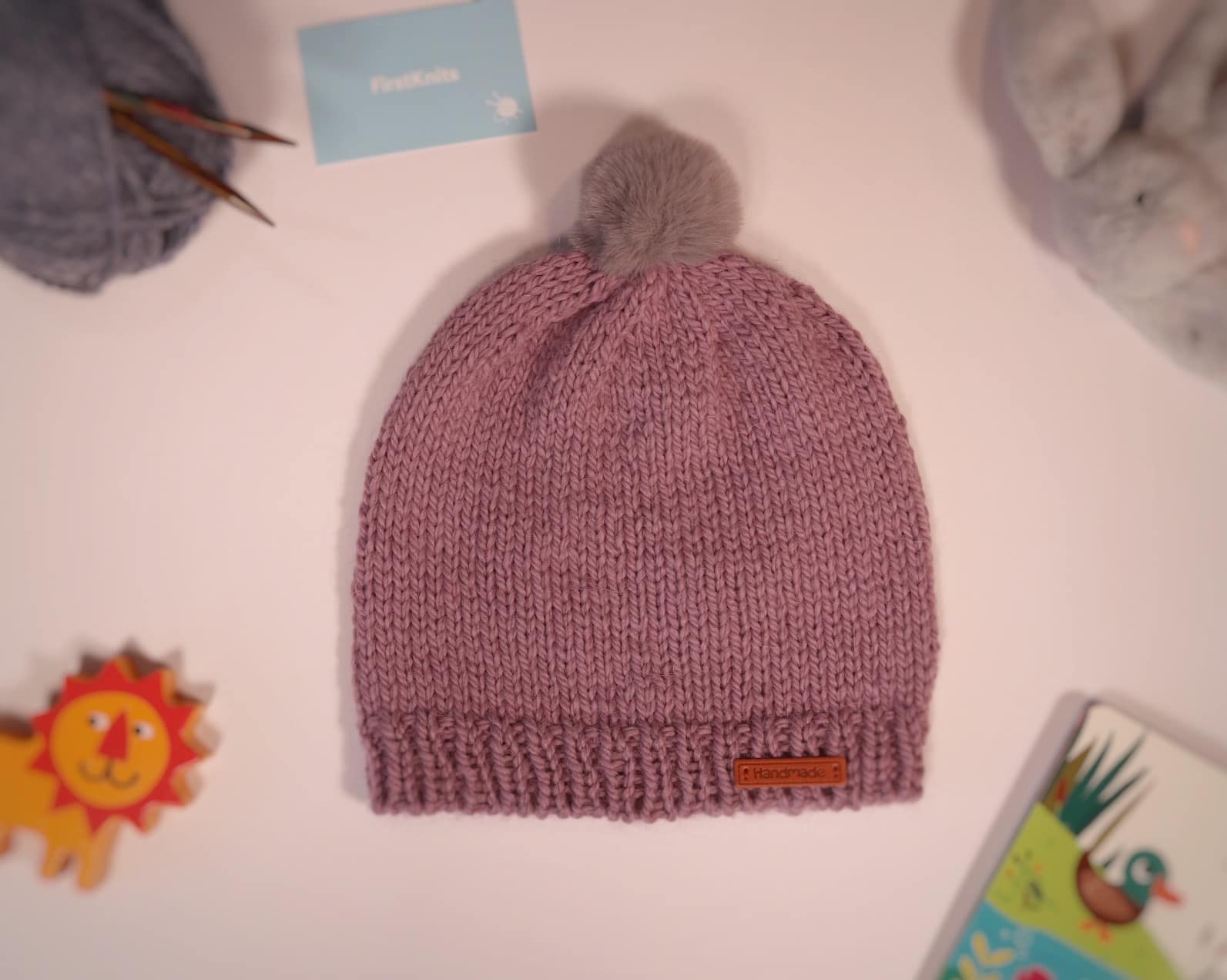 Hand-knitted baby/toddler hat, sizes 6 months to 24 months, mulberry - main product image