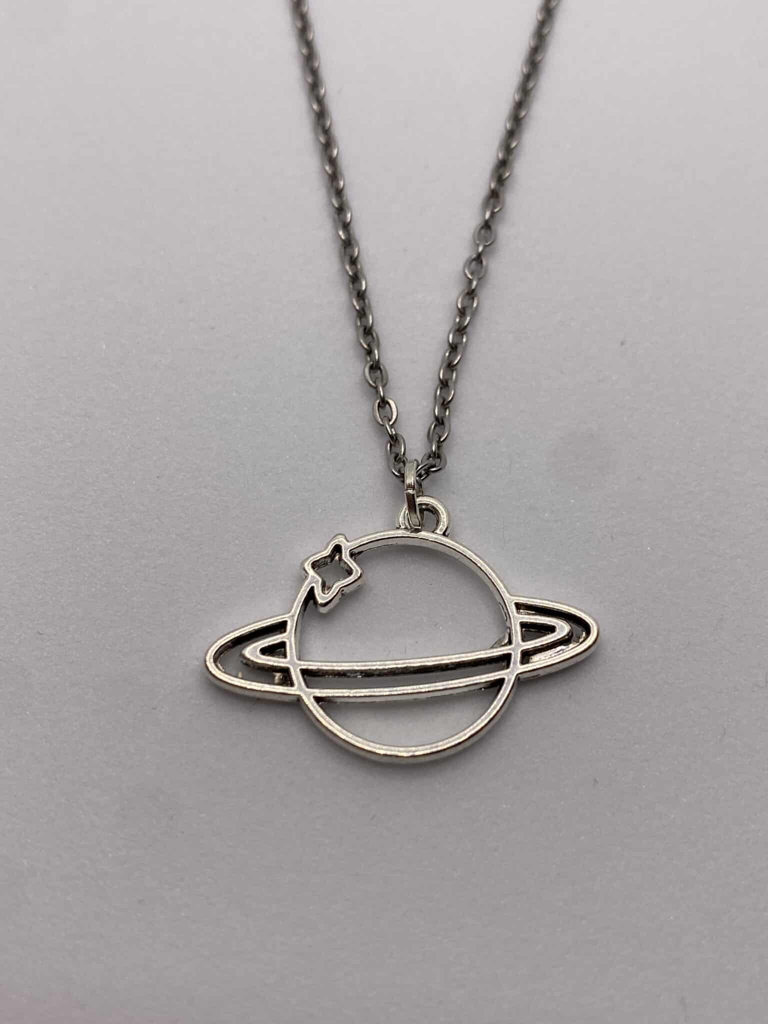 Silver coloured solar system Saturn planet pendant on 18 inch chain necklace - main product image