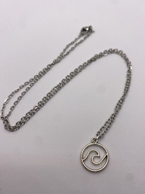 Silver coloured ocean wave pendant on 18 inch chain necklace - product image 2