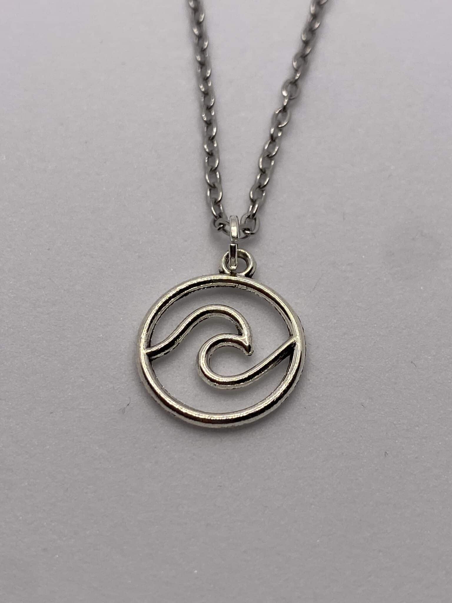 Silver coloured ocean wave pendant on 18 inch chain necklace - main product image