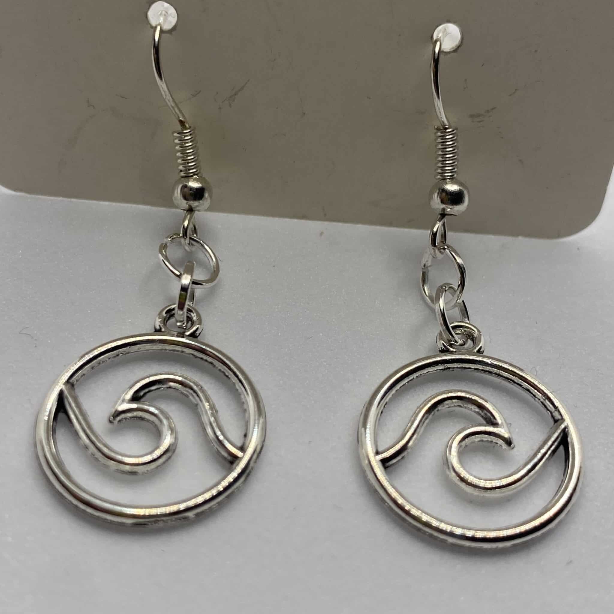 Silver coloured ocean wave drop earrings - main product image