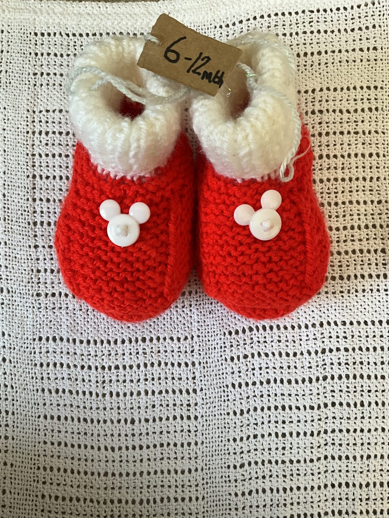 Handknitted 6-12mth Red and White Mickey bootees - main product image