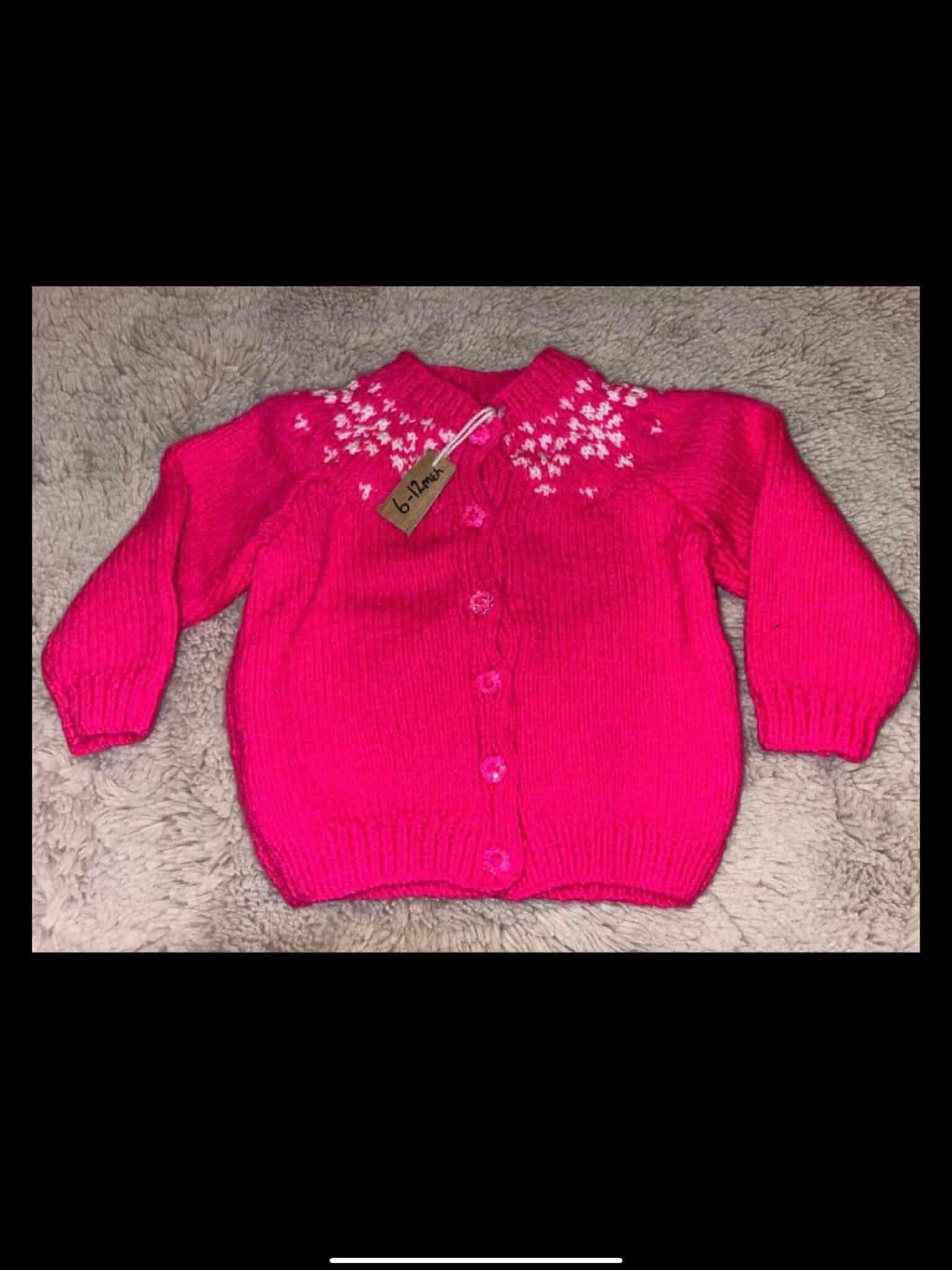 Handknitted 6-12mth (20 inch chest) Flower Power pink cardigan - main product image