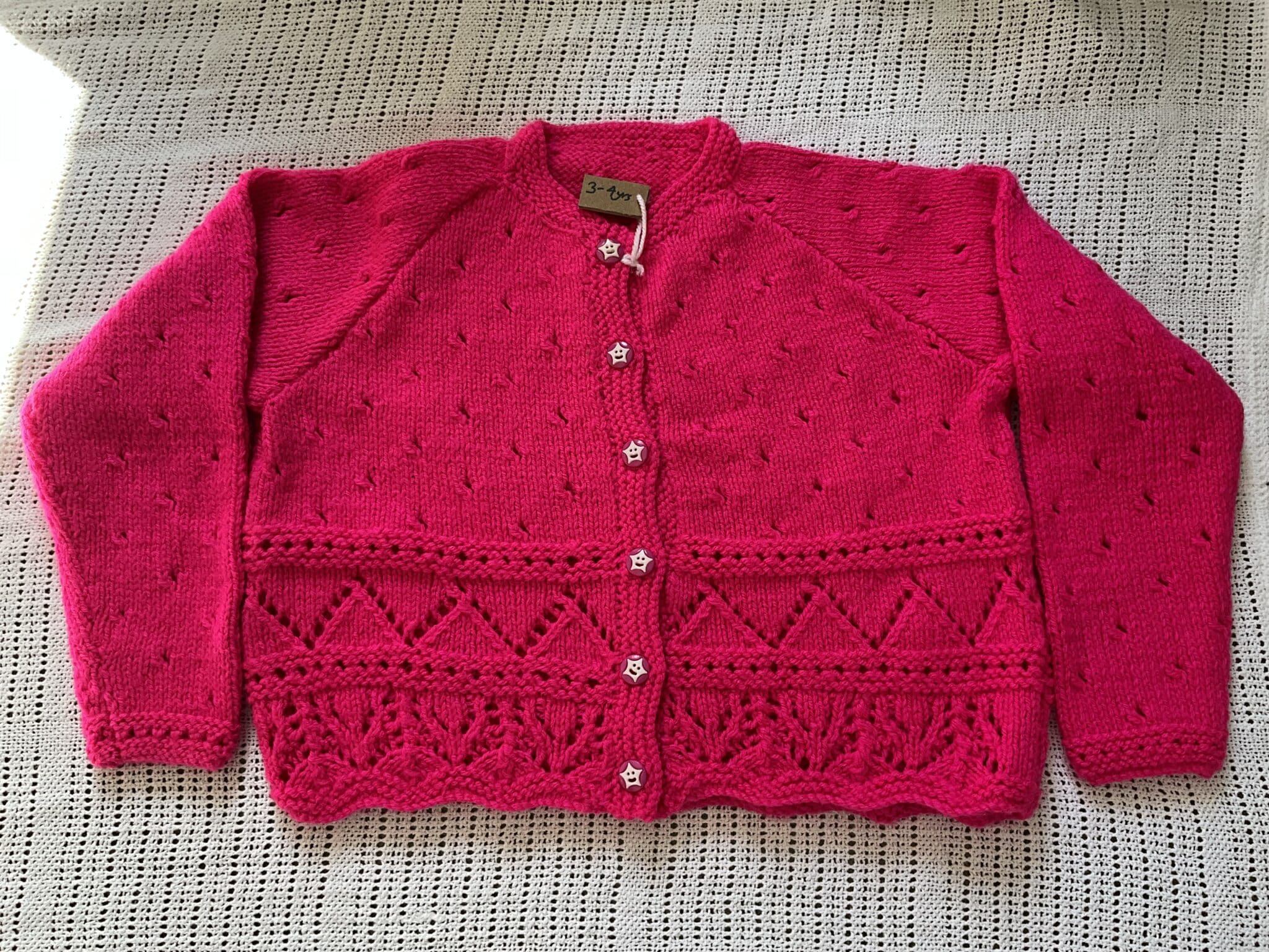 Handknitted 3-4yrs (24inch chest) Pink lace/pattern cardigan - main product image