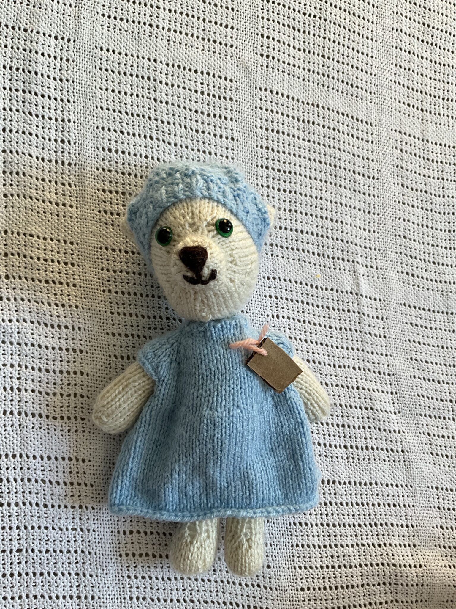 Handknitted bear with blue dress and hat set - main product image