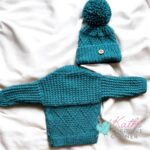 Hand knitted baby cardigan and hat in Teal