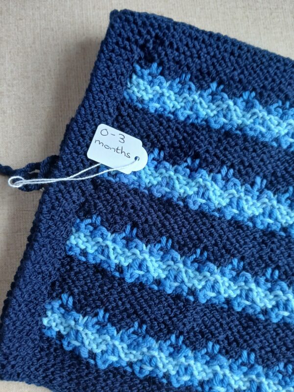 Hand knitted baby poncho with ties. Blue. Approx 0 to 3 mths. - product image 2