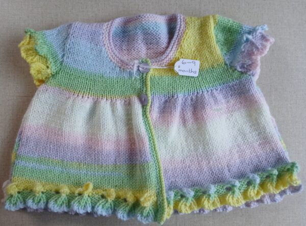 Hand-knitted cap sleeved cardigan. Approx 6 to 9 months. - main product image