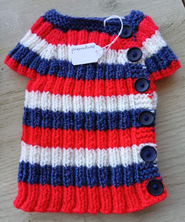 Hand-knitted baby top in red, white and blue. Approx premature. - main product image