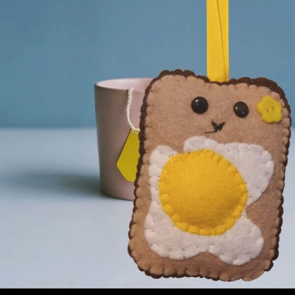 Hand sewn ‘Fried egg on toast’ felt hanging decoration - main product image