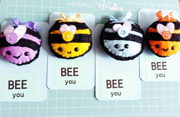 Hand sewn felt bee pocket hugs - main product image