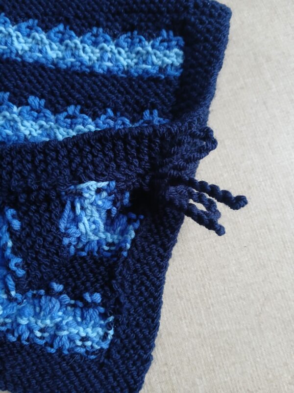 Hand knitted baby poncho with ties. Blue. Approx 0 to 3 mths. - product image 3
