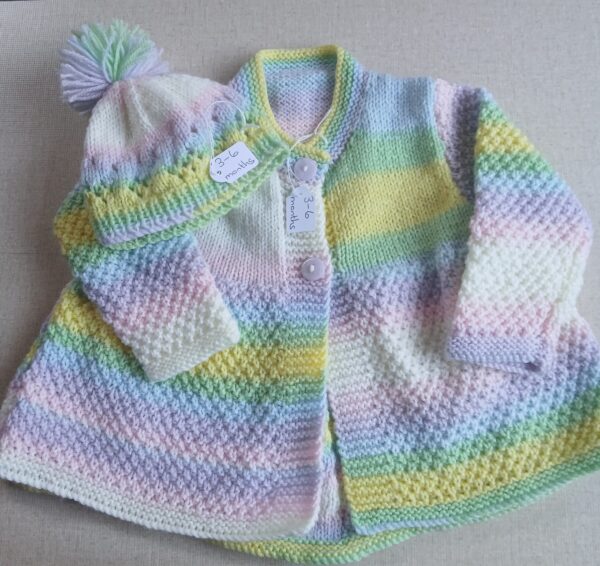 Hand-knitted baby cardigan/coat and pompom hat. Approx 3 to 6 months. - main product image