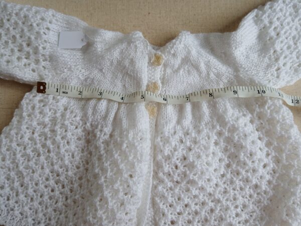 Hand- knitted baby Matinee cardigan/ coat. Approx 0 to 3 months. All proceeds to charity. - product image 2