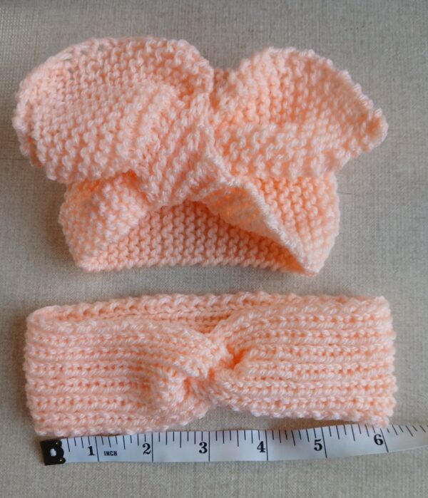 Two Baby Girl head bands in pale peach. Approx 0 to 3 months - main product image