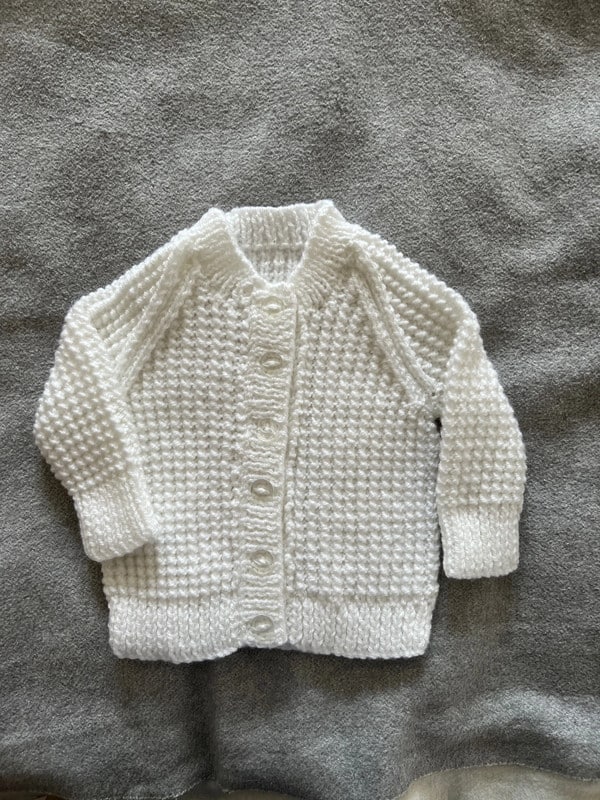 Beautiful patterned hand knitted cream cardigan size 20” - main product image