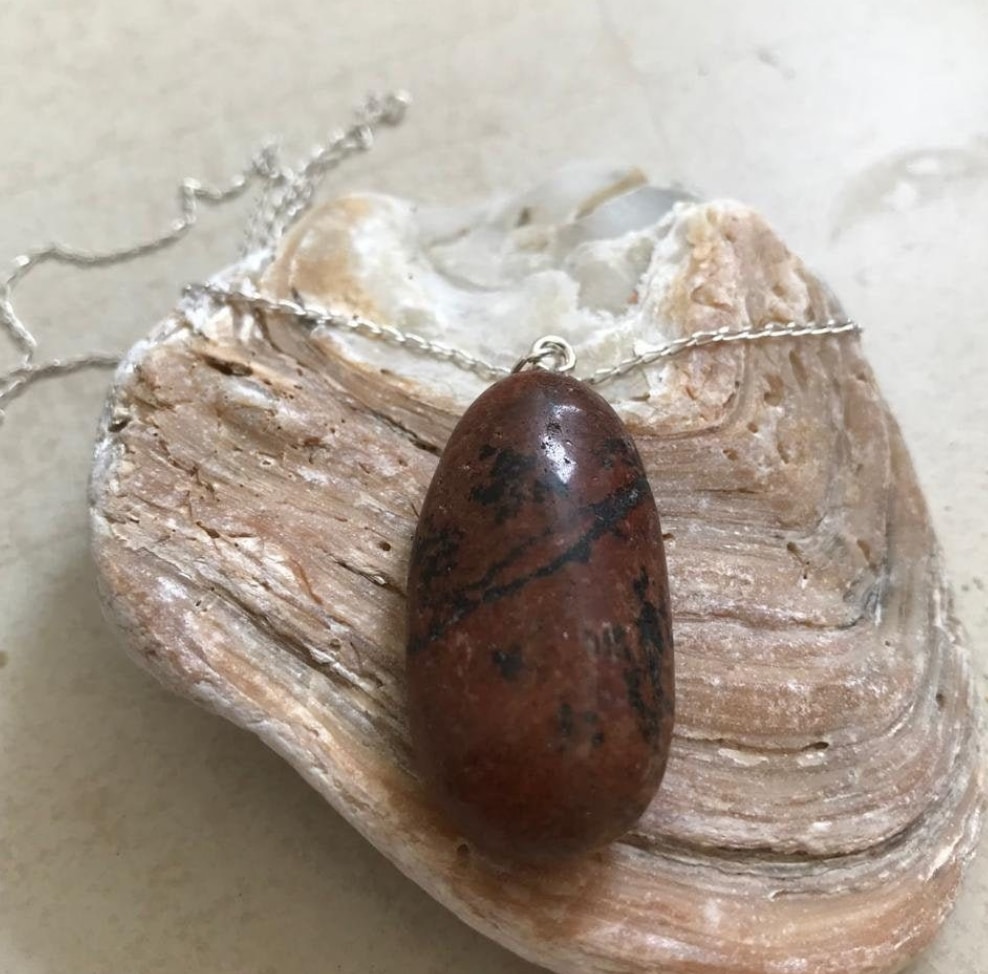 Deep Red Granite with a Sterling Silver necklace. - main product image