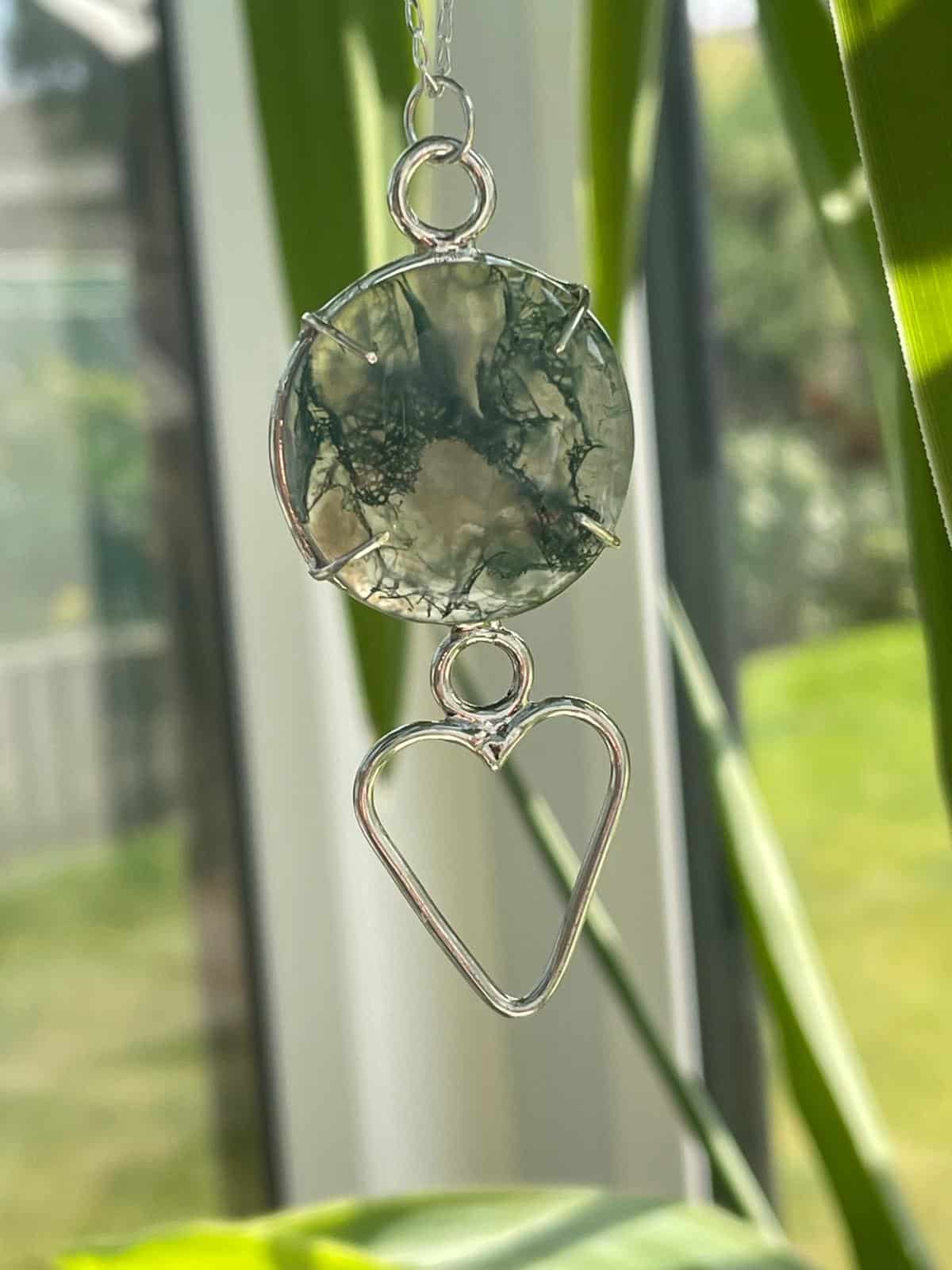 Beautiful Moss Agate Quartz crystal Pendant with a Sterling Silver Heart and Chain. - main product image