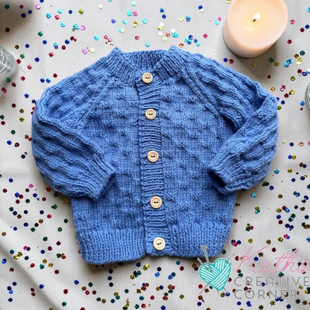 Hand knitted baby cardigan, bob hat, Booties and mitts set
