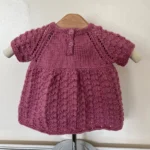 Hand knitted girls pink dress chest 20” (6-9 months approx)