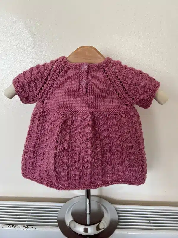 Hand knitted girls pink dress chest 20” (6-9 months approx)