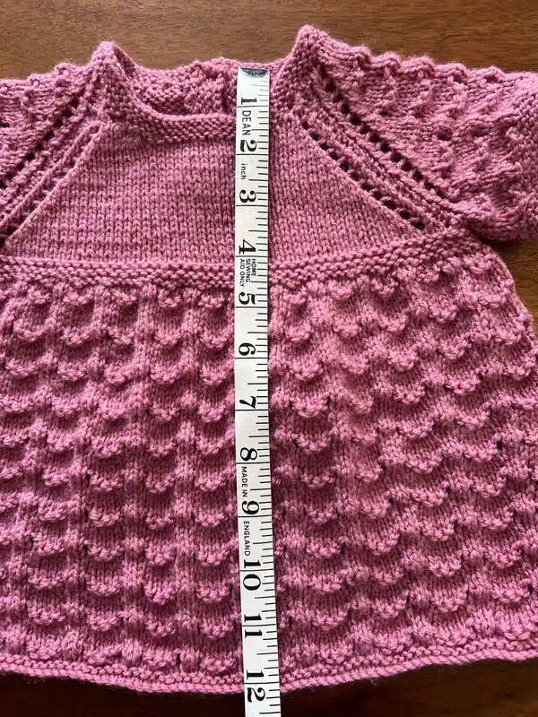 Hand knitted girls pink dress chest 20” (6-9 months approx)