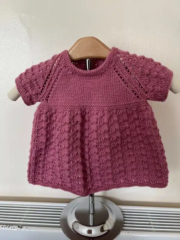 Hand knitted girls pink dress chest 20” (6-9 months approx)