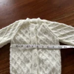 Beautiful patterned hand knitted cream cardigan size 20” (6-12 months)