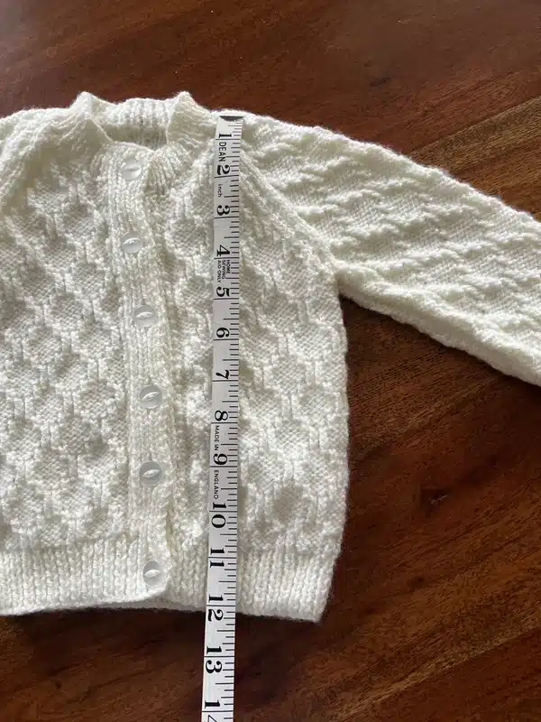Beautiful patterned hand knitted cream cardigan size 20” (6-12 months)