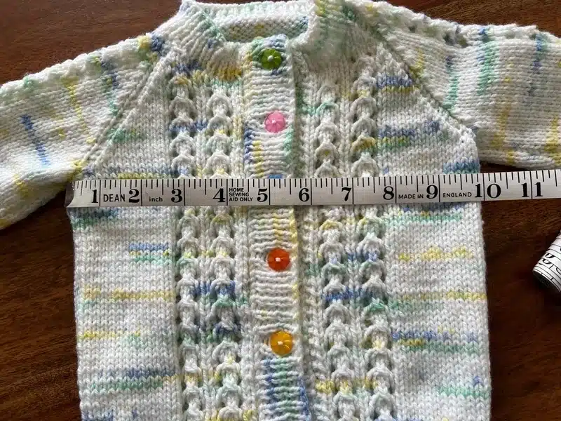 Hand knitted multicoloured pattern cardigan size 20” chest (6-12months) – new