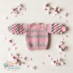 Crocheted Baby girls Bobbles sleeved cardigan